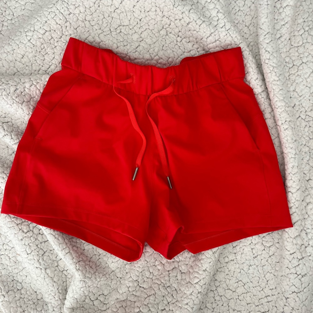 Lululemon bright red on the fly mid rise shorts